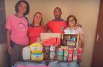 Organizadores da 4ª Corrida contra o Câncer doam alimentos arrecadados, em Ouro Branco