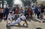 Grupo de capoeira prestigia Festival de Congado de Lafaiete 